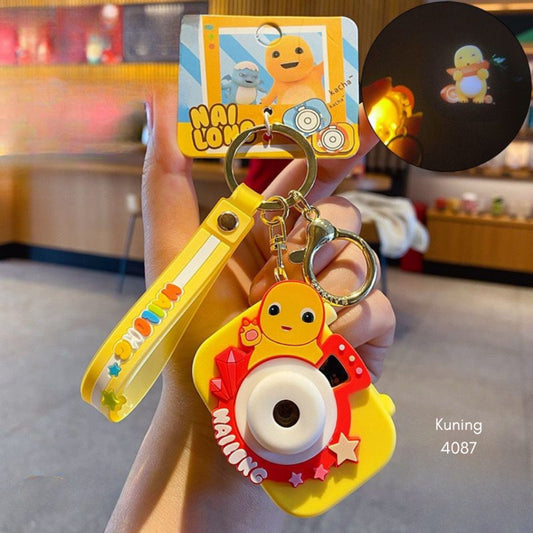 Pekanbaru Gantungan Kunci Nailong Proyektor Kamera Dino Kuning Screen Display Gemoy Keychain Unik